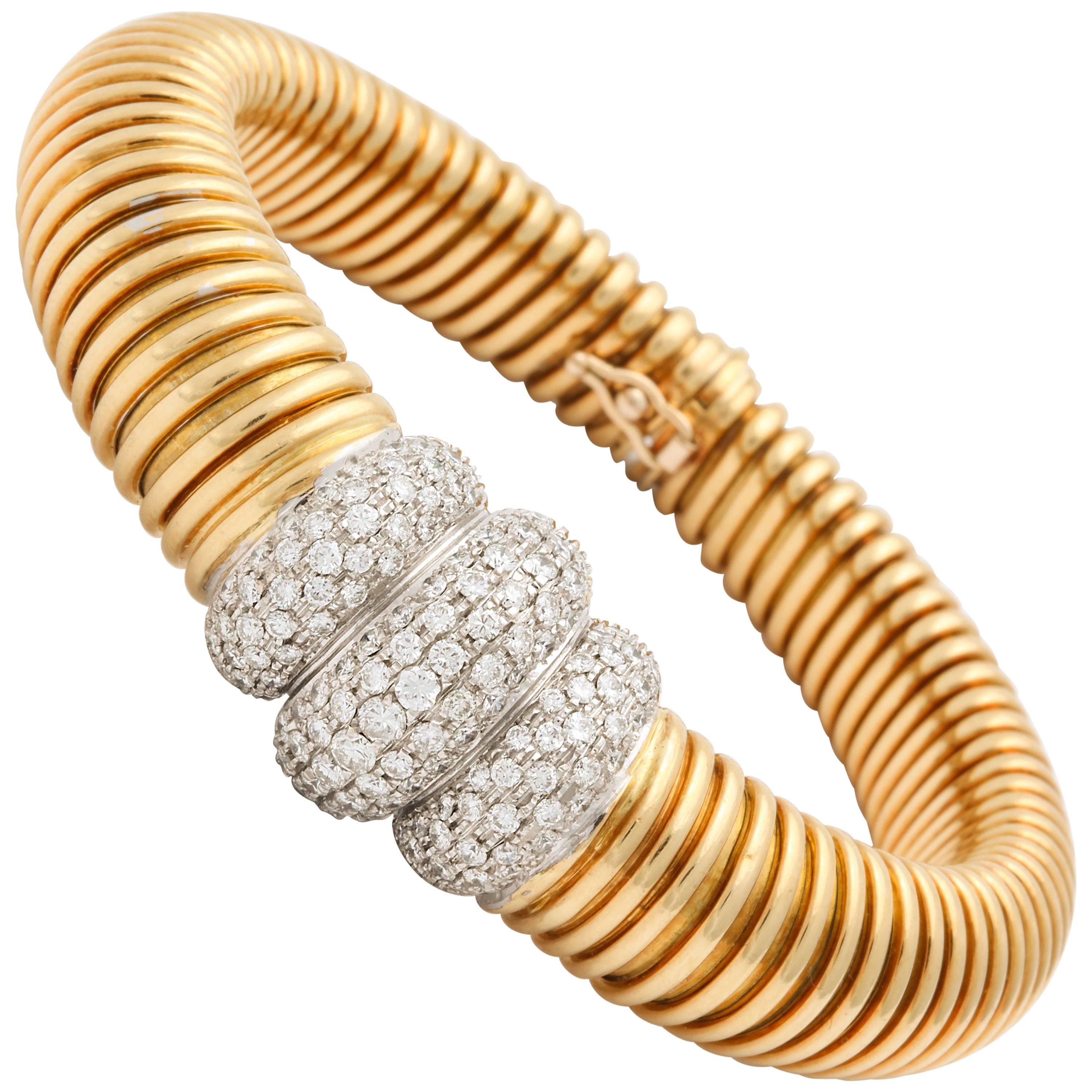 1980s Flexible Tubogas Snake Diamond and High Polish Ridged Gold Bracelet