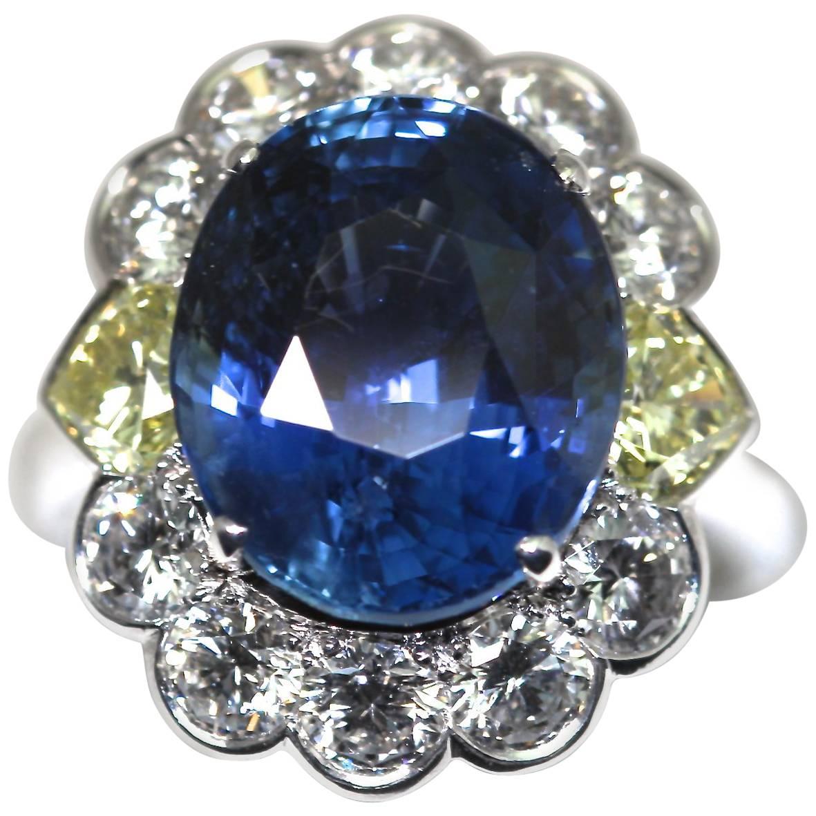 GRS Certified Natural Oval 9.99 Carat Sapphire with Yellow Heart Shape Diamonds