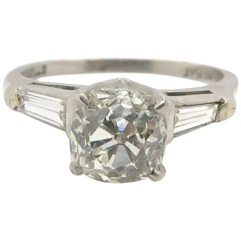 Art Deco Platinum Old Cushion Cut Diamond and Baguette Cut Diamond Ring For Sale