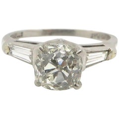 Art Deco Platinum Old Cushion Cut Diamond and Baguette Cut Diamond Ring