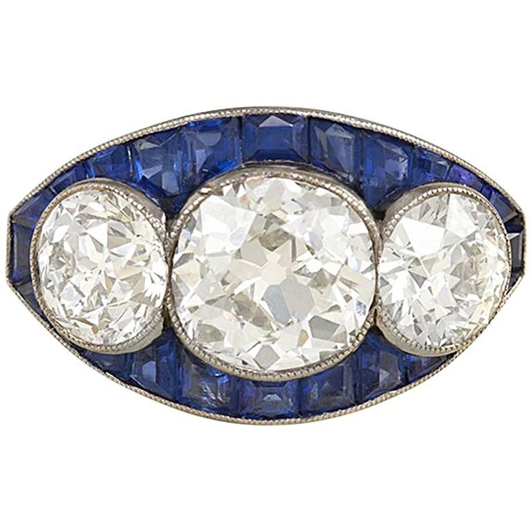 Art Deco Three-Stone Diamond and Calibré Sapphire Ring
