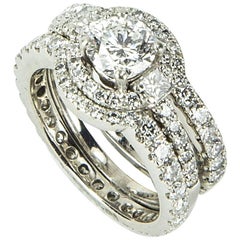 Diamond Platinum Halo Ring and Two Fitted Platinum Diamond Bands