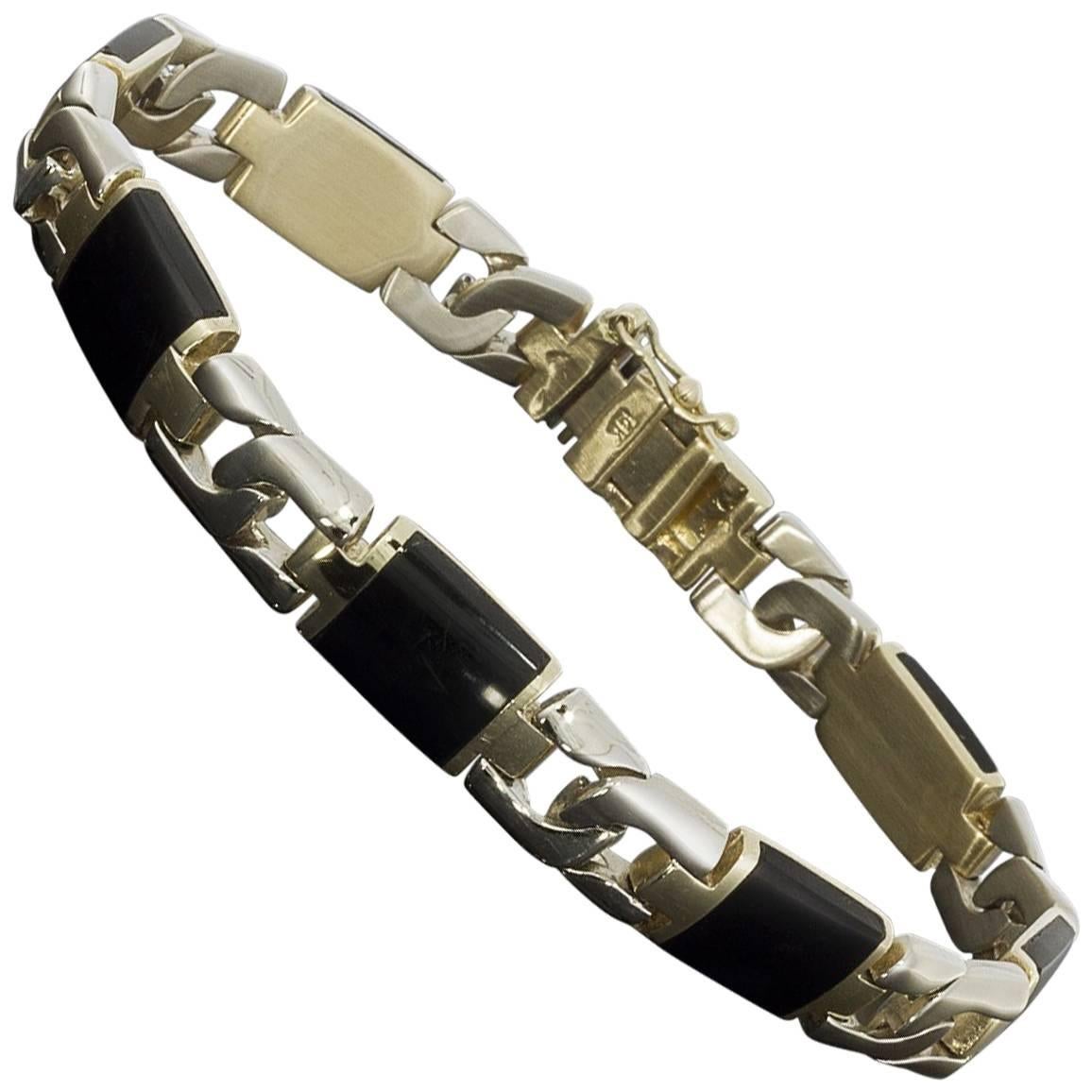 Black Onyx and 14 Karat Two-Tone Gold Curb Link Bracelet