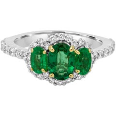 Emerald Diamond Three-Stone Halo Two-Color Gold Ring