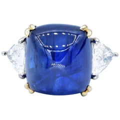 33.85 Carat Sapphire Cabochon and Trillion Cut Diamond Platinum and Gold Ring