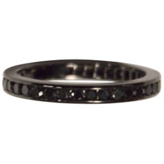 Mick Ring is Set with Black Diamonds in 18 K White Gold with Black Rhodium