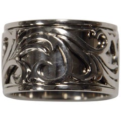 Prince Rolling Ring is in 18 carat White Gold Carved Scroll Motifs
