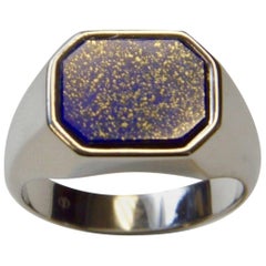 The Chevaliere Ring is in White Gold Set with a Lapis Lazuli