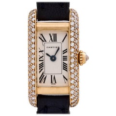 Cartier Damen Gelbgold Diamant Tank Allongee Quarz-Armbanduhr, circa 1990er Jahre