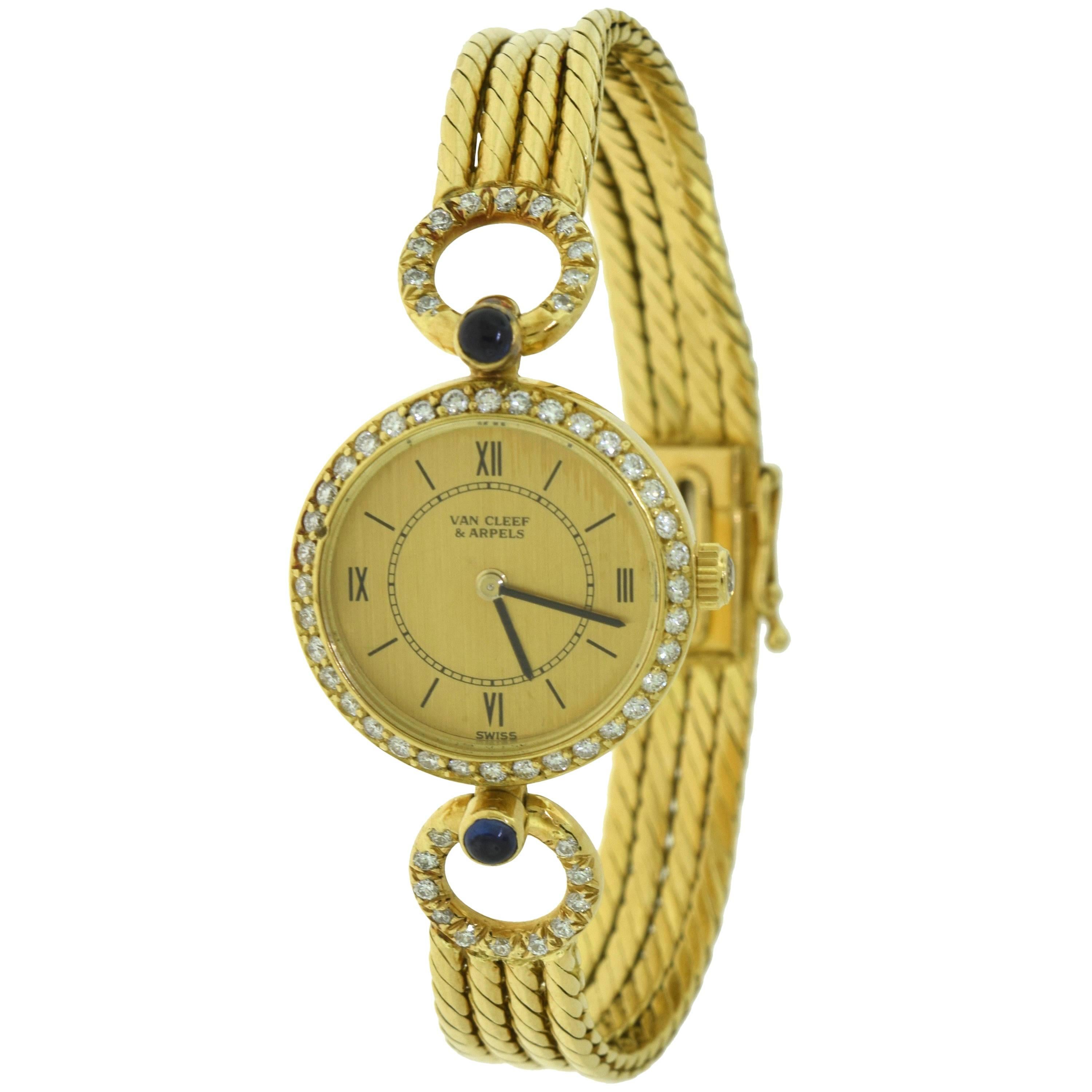 Vintage 1990 Van Cleef & Arpels 18k Yellow Gold Watch with Diamonds and Sapphire For Sale