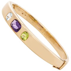 Chanel 18 Karat Yellow Gold Amethyst & Peridot Baroque Bracelet 