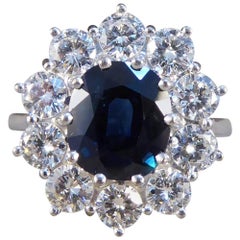 Sapphire and Diamond 18 Carat White Gold Cluster Engagement Ring