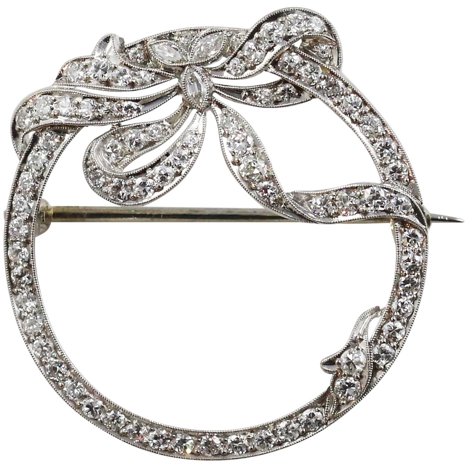 Art Deco Platinum and Diamond Bow Motif Brooch