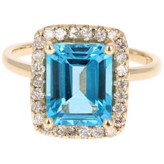 4.61 Carat Yellow Gold Blue Topaz Diamond Ring