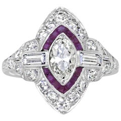 Platinum Art Deco Oval Diamond and French Cut Ruby Engagement Ring
