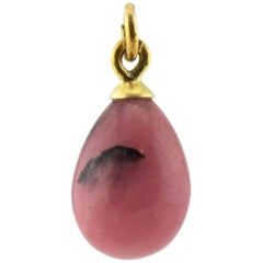 Antique Russian Carved Semiprecious Rhodonite and Gilded Silver Pendant Egg