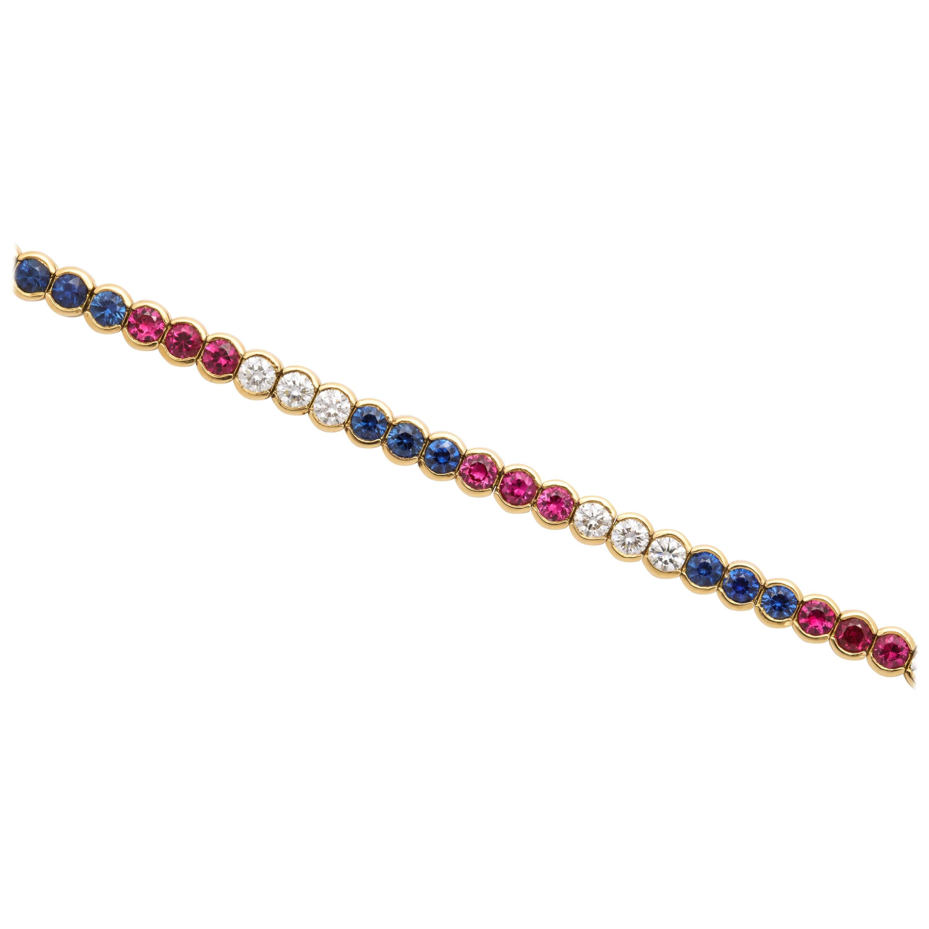 Diamond, Ruby and Sapphire Yellow Gold Tennis Bracelet For Sale