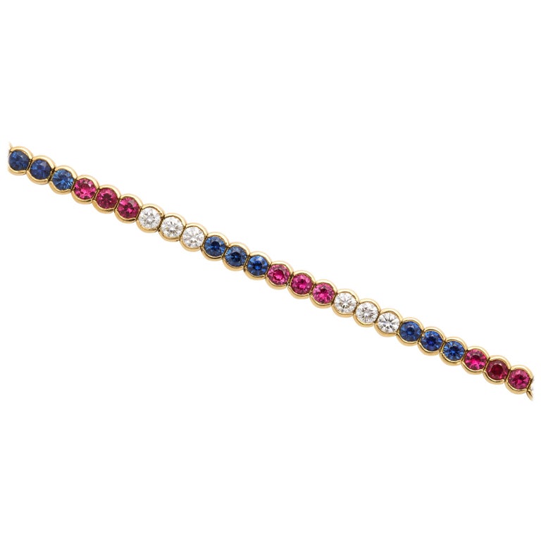 Diamond, Ruby and Sapphire Yellow Gold Tennis Bracelet For Sale at 1stDibs