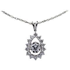 14 Karat White Gold .75 Carat Round Diamond Pear Shaped Halo Pendant Necklace