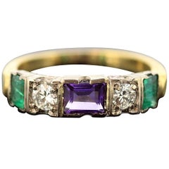 Vintage 18 Karat Yellow Gold Ladies Ring with Diamonds, Emerald and Amethyst