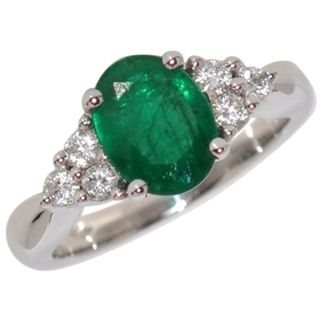 Emerald and White Diamonds White Gold Engagement Ring