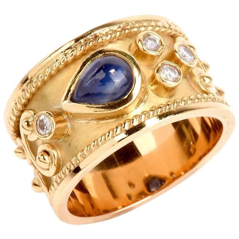 1990s Teardrop Blue Sapphire Diamond Yellow Gold Wide Cocktail Ring For