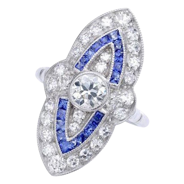 Marquise Diamond Calibrated Sapphire Platinum Ring