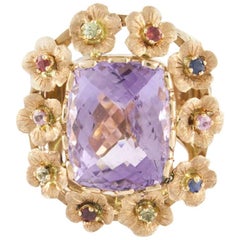 Ring aus Roségold mit Edelsteinen und zentralem Amethyst 