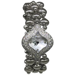 Chopard Ladies Yellow Gold Pushkin Three-Row Diamond Bezel Bracelet Wristwatch