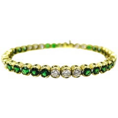 Tsavorite and Diamond Yellow Gold Tennis Bracelet