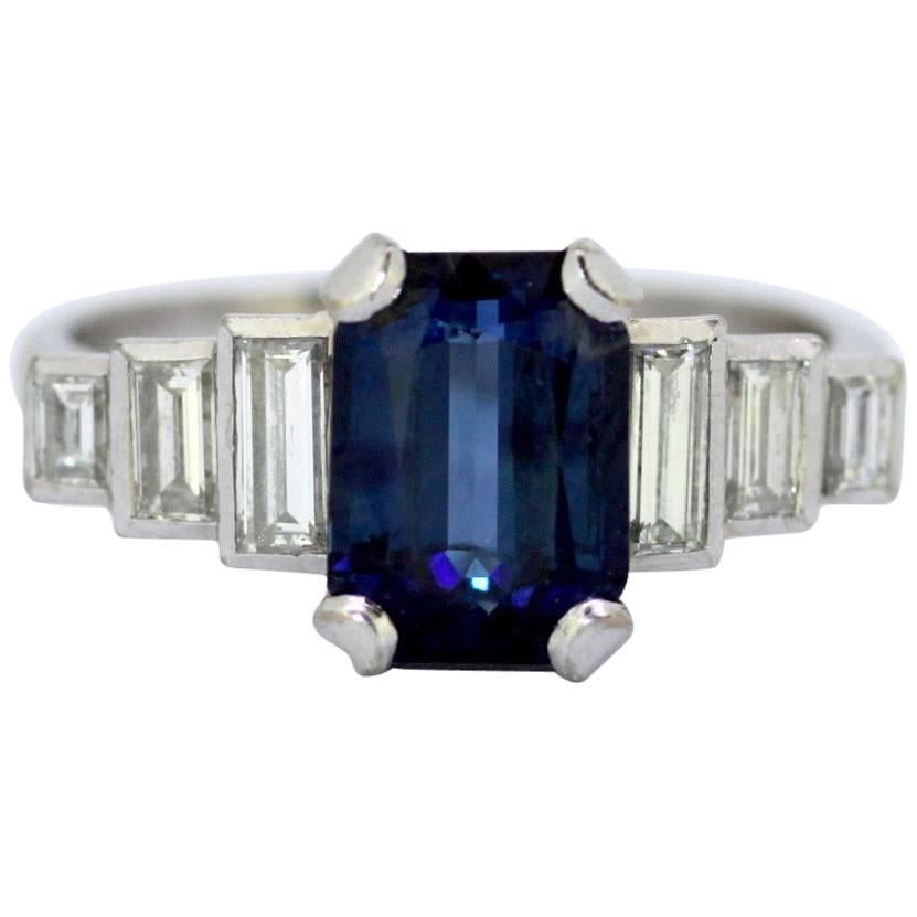 Vintage 18 Karat Gold Ladies Ring with Blue Sapphire and Diamonds, circa 1970s
