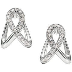 Boucles d'oreilles de la collection « Essence » en or blanc 18 carats et diamants