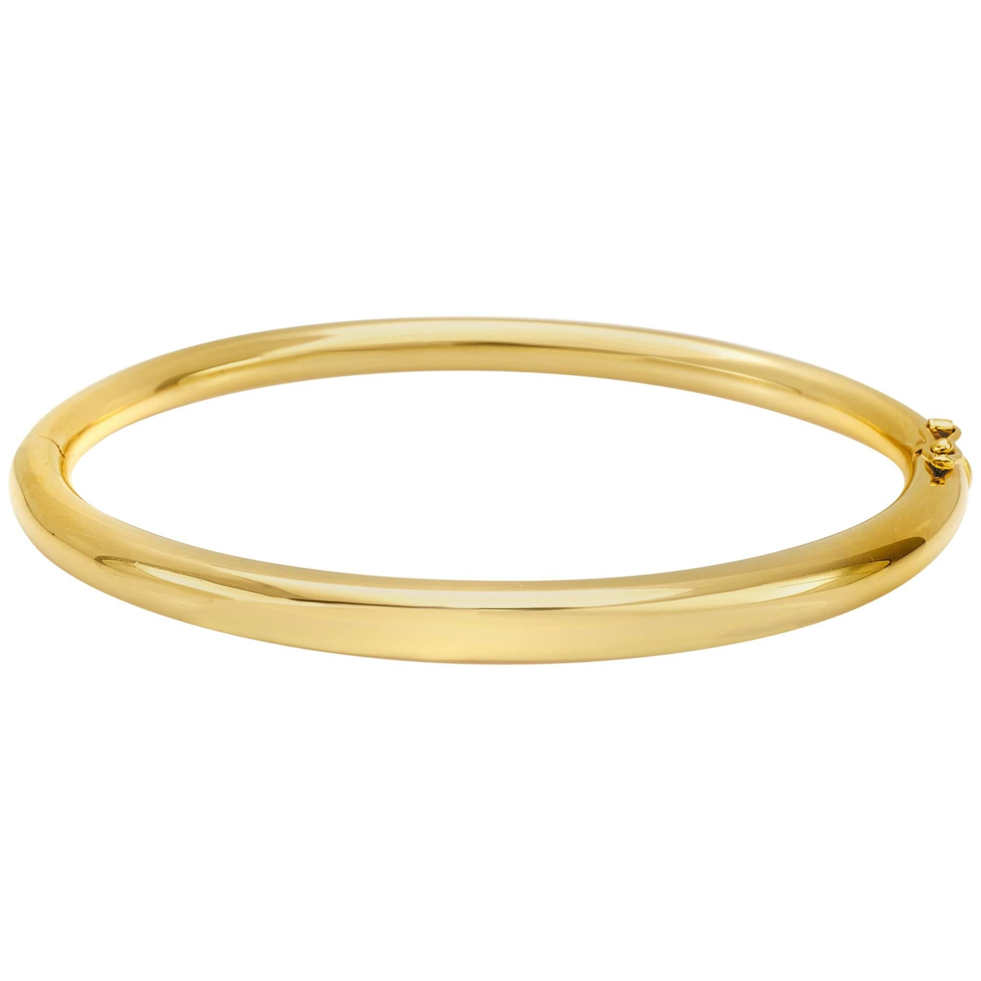 Bracelet jonc de la collection Essence en or jaune 18 carats
