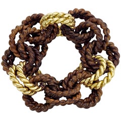 Bracciale della collezione "Rope" in oro giallo 18 carati e palissandro