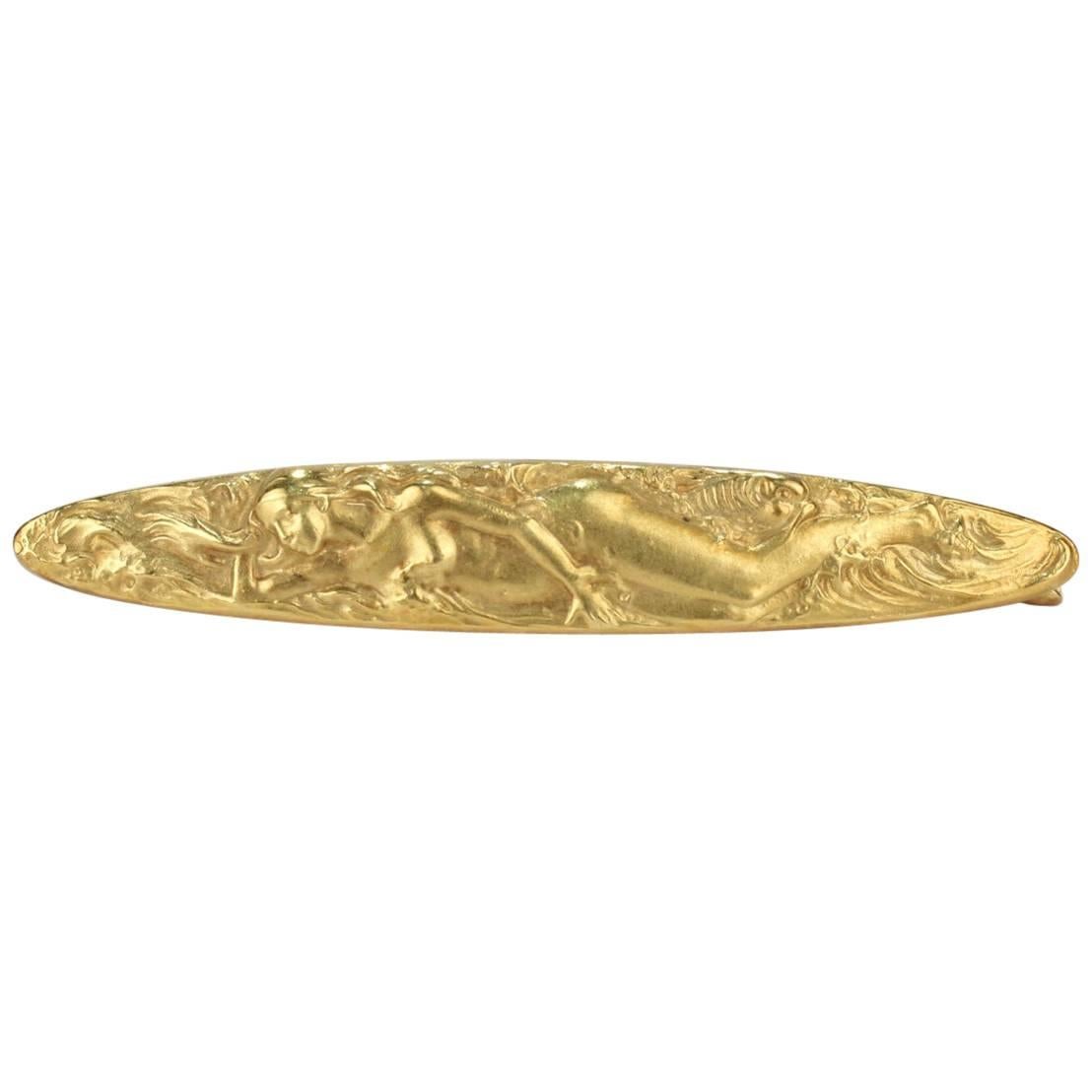 Art Nouveau Period 14 Karat Yellow Gold Lapel Pin with a Nude Lady by Krementz