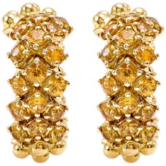 Paire de boucles d'oreilles Flirt Collection en or jaune 18 carats et saphir jaune