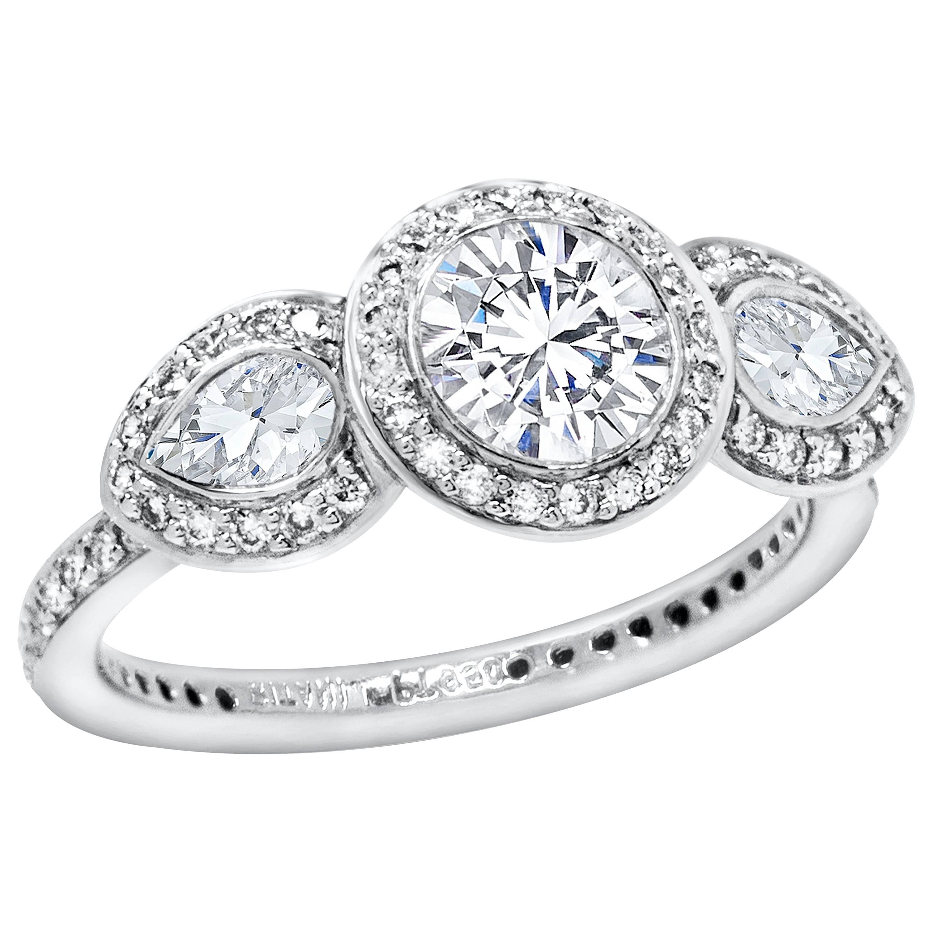Round Diamond Three-Stone Halo Engagement Ring