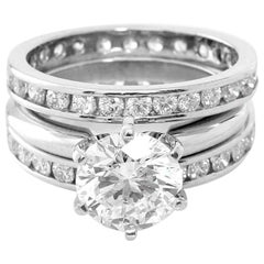 Round Brilliant Cut Solitaire and Diamond Bands