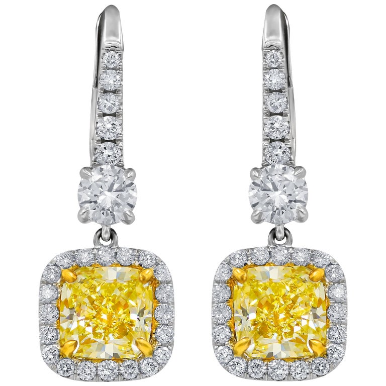 GIA Certified 2.55 Carat Canary Yellow Diamond Earrings For Sale