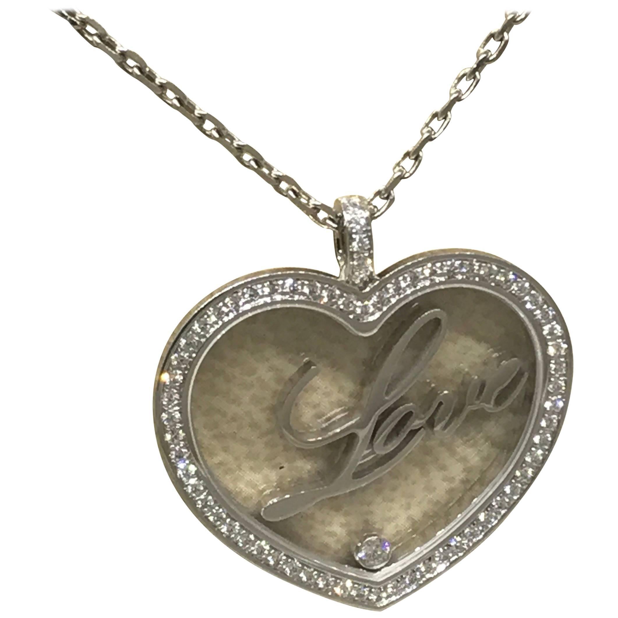 Chopard Happy Diamonds White Gold Heart Pendant / Necklace with "Love" 79/7616 For Sale