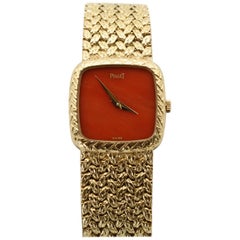 Piaget Ladies Yellow Gold Used Coral Faced Crystal Wristwatch