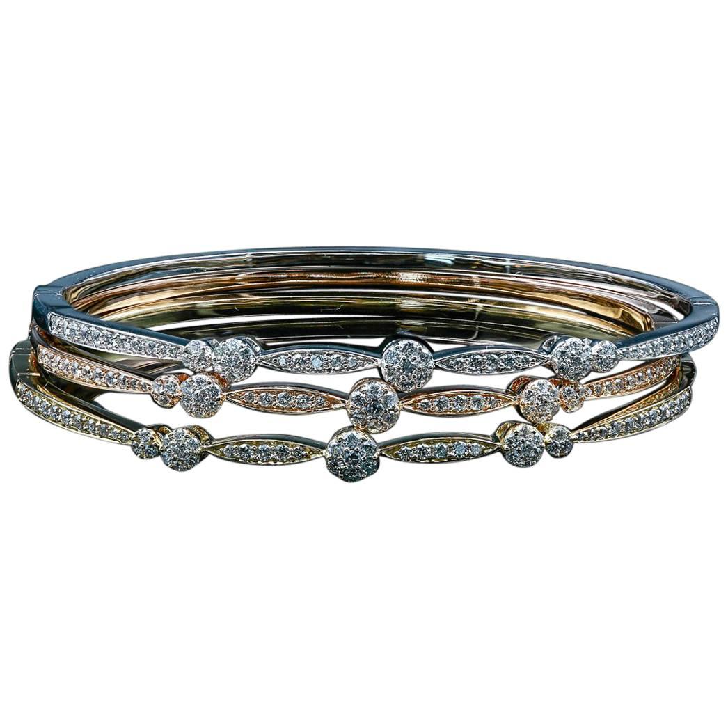 Stackable 18 Karat Gold and Diamond Bangles Featuring 0.65 Carat of VS Diamonds For Sale