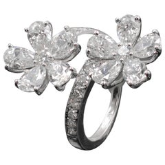 18 Karat Gold Double Flower Ring Featuring 4.77 Carat of Pear Shaped Diamonds