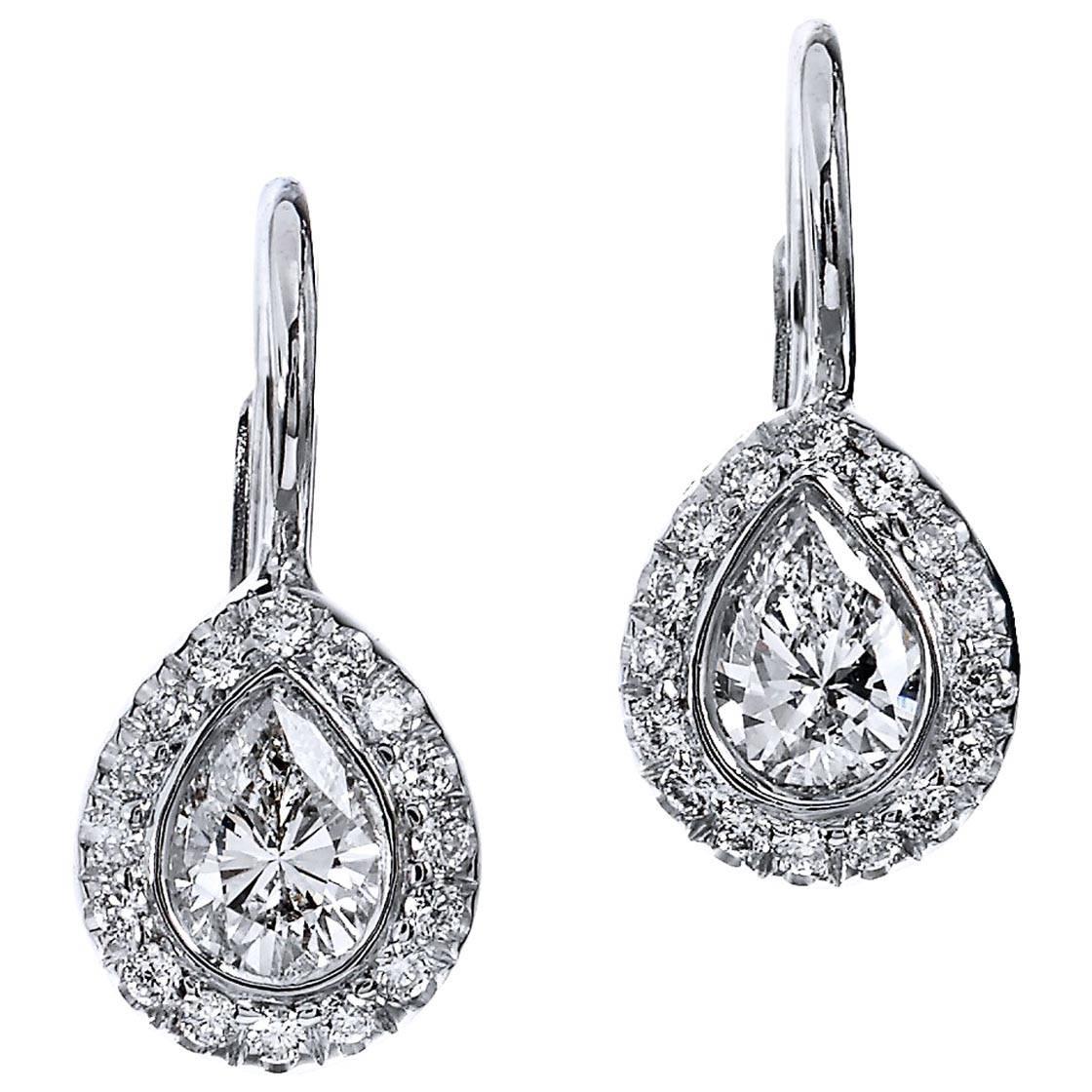 0.41 Carat Pear Shaped Diamonds in 18 karat White Gold with Lever-Back Earrings
