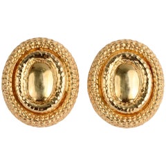 Grandes boucles d'oreilles ovales en or