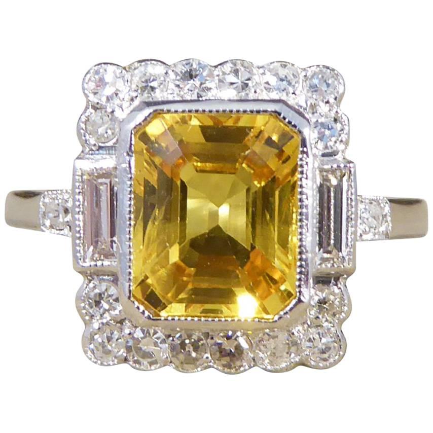 Yellow Sapphire and Diamond Engagement Ring in 18 Carat White Gold