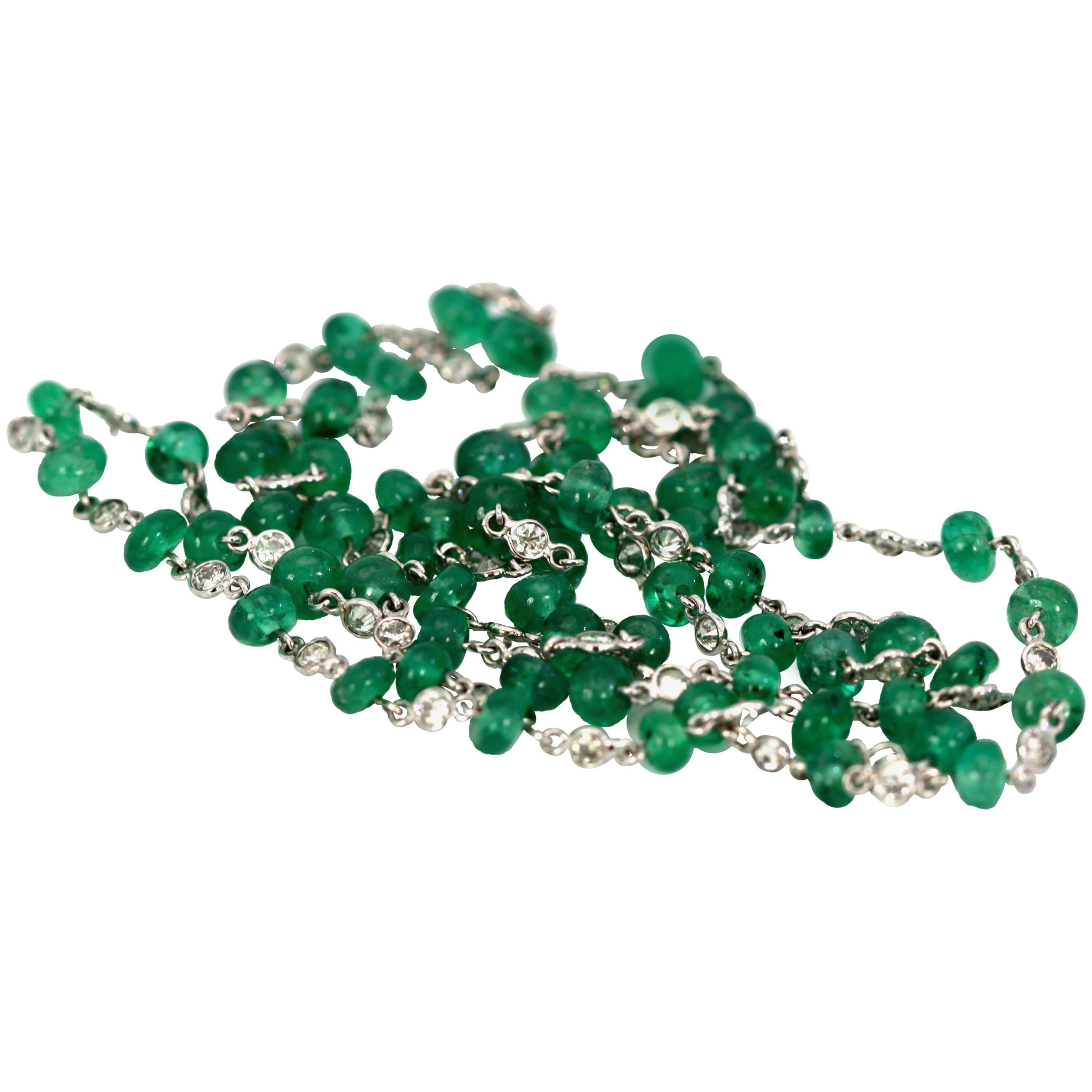 Gorgeous Emerald and Diamond Bead Necklace consists of sixty-five (65) Diamonds with a clarity of SI2 and color H-I. The Emeralds have a slightly yellowish green grade and there are sixty-five (65) emerald beads. This necklace alternates between one