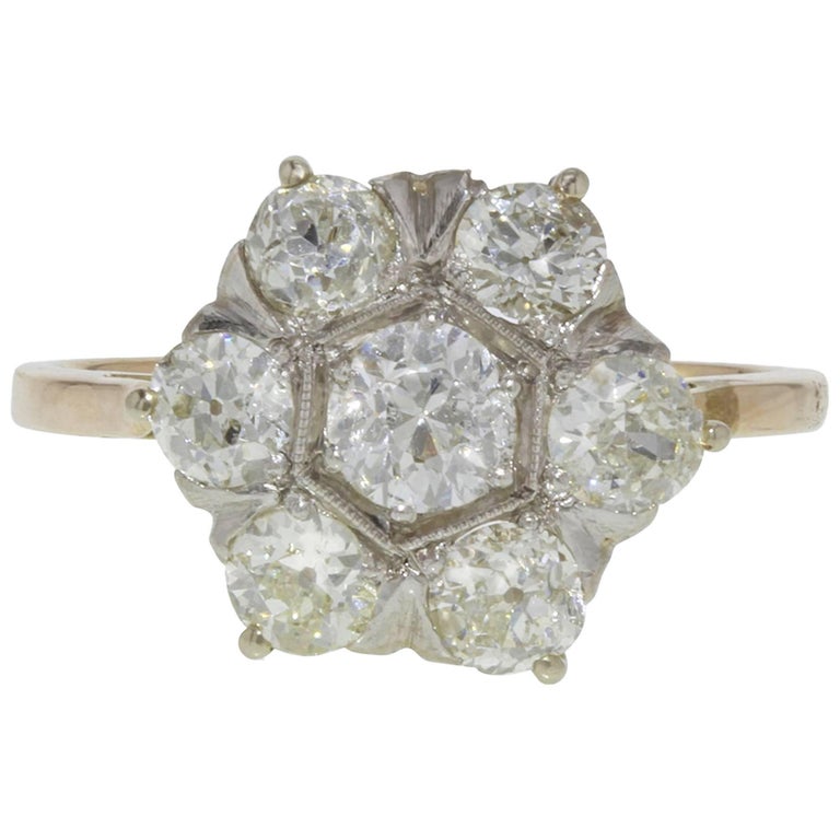 Vintage Platinum and Diamond Cluster Floral Engagement Ring For Sale at