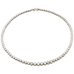 Tiffany & Co. Classic Graduated Round Diamond Line Necklace, circa 1930s