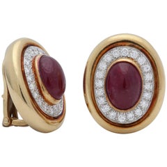 David Webb 1980s Oval Shaped Cabochon Ruby with Diamonds Gold Clip-On Earrings